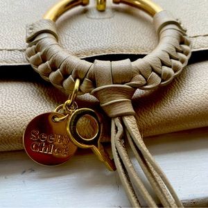 See by Chloe Joan Leather Convertible Clutch in Cement Beige. Only used twice.